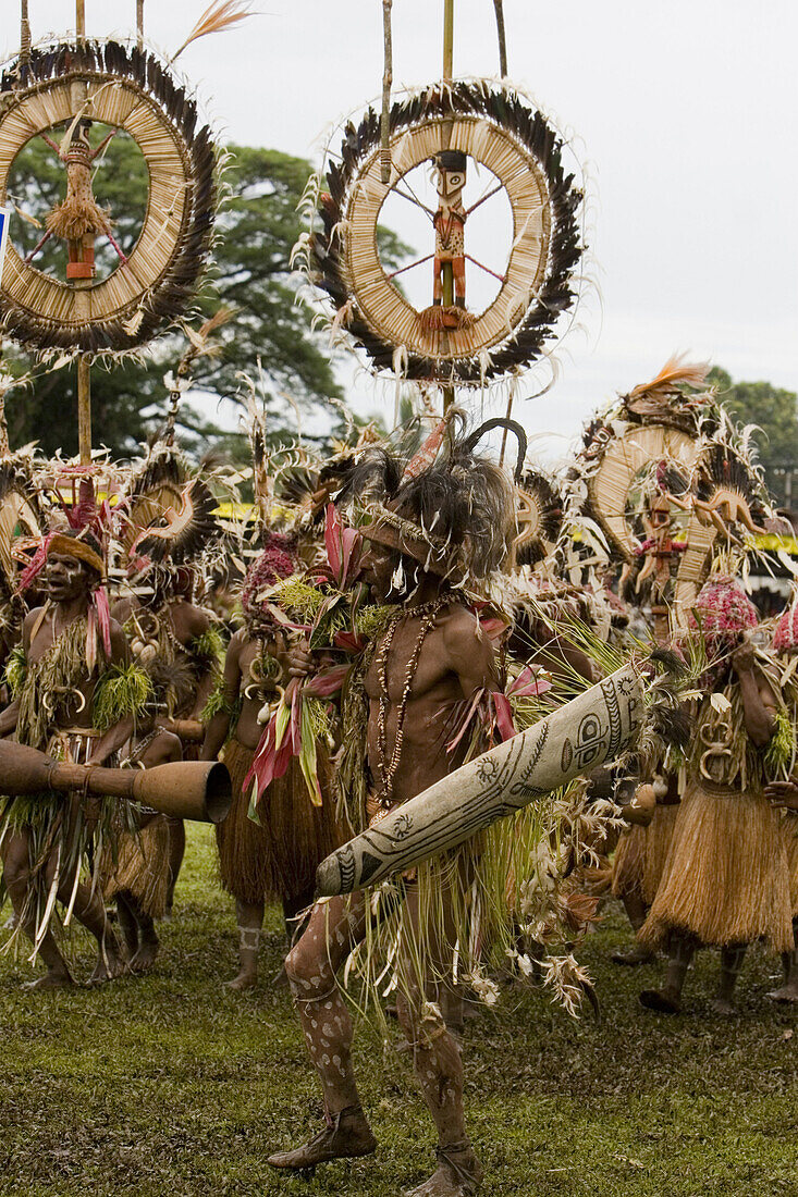 Men wearing headdress and traditional costumes at Singsing Dance, Lae, Papue New Guinea, Oceania