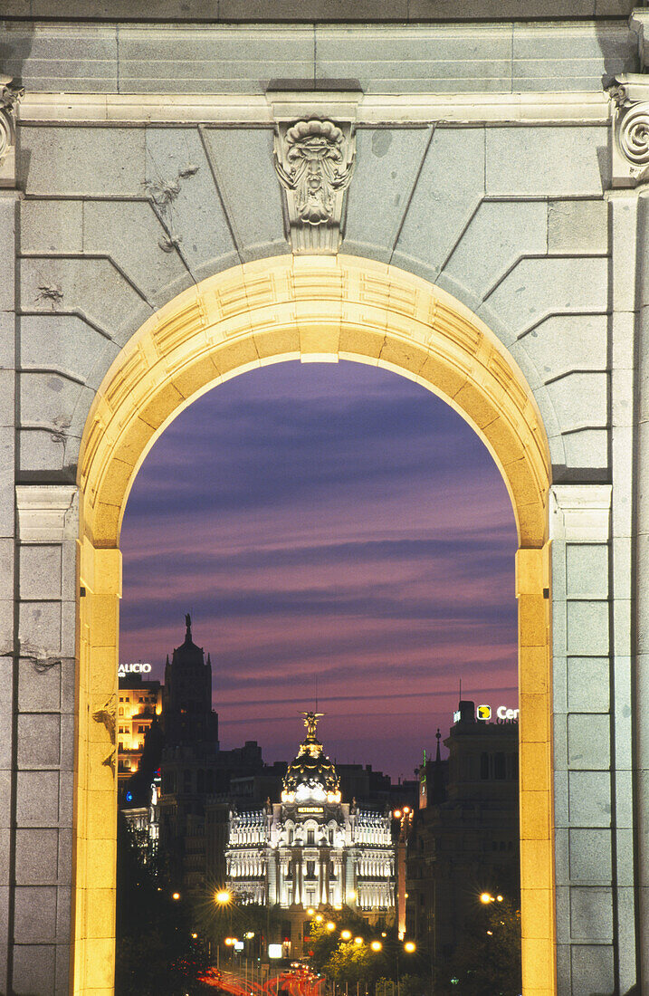 View of Calle de Alcalá & Metropolis building through Puerta de Alcalá. Madrid. Spain