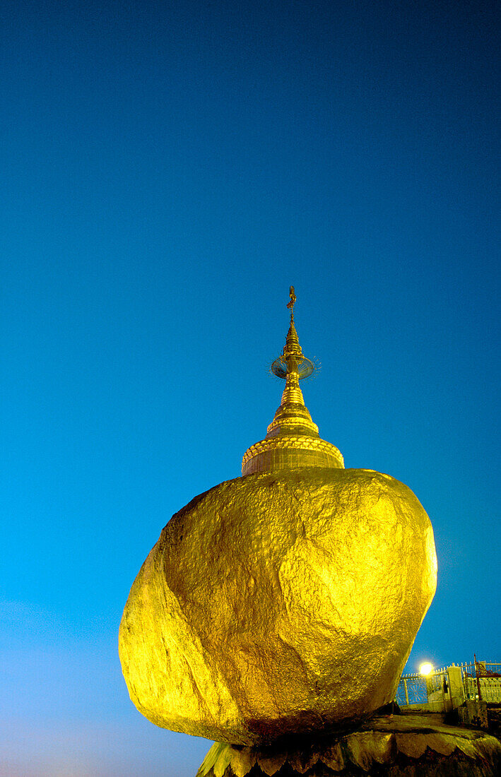 Kyaiktiyo Pagoda (Golden Rock Pagoda) at dusk. Mon State. Myanmar (Burma)