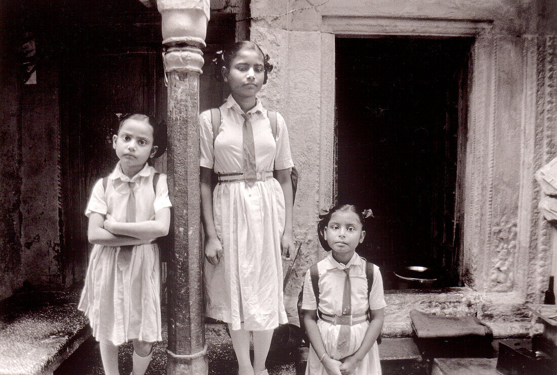Girls waiting to go to school. Benares. India
