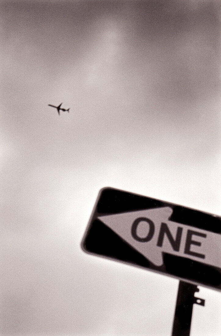 Airliner flying over Brooklynn. New York City. USA