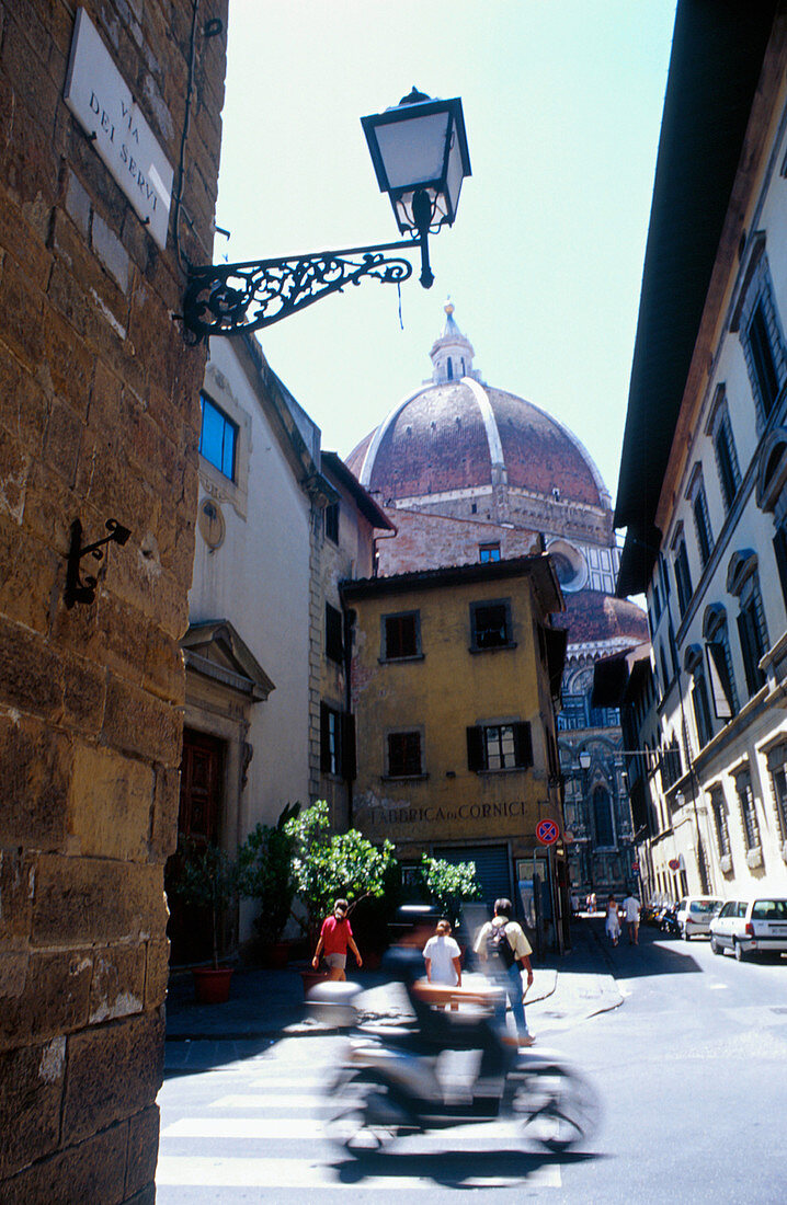The Duomo cupola as seen from Via dei Servi. Florence. Italy
