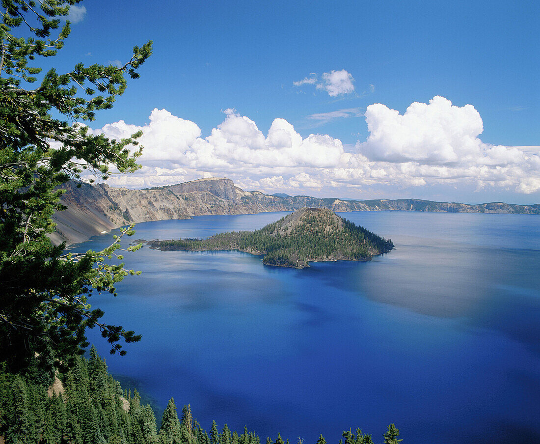 Summer clouds over Wizard Island from Discovery point (afternoon). Crater Lake National Park. Oregon. USA