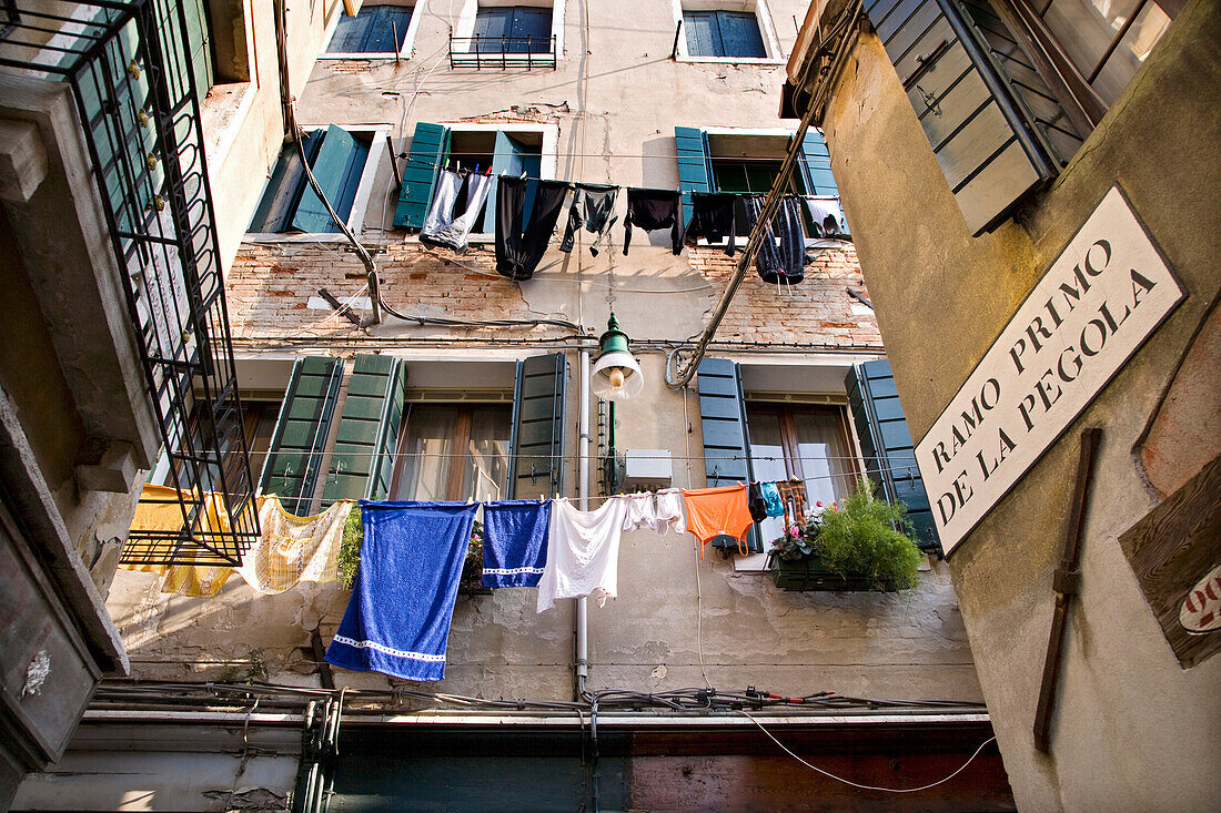 Clothesline hung between houses, Venice, Veneto, Italy