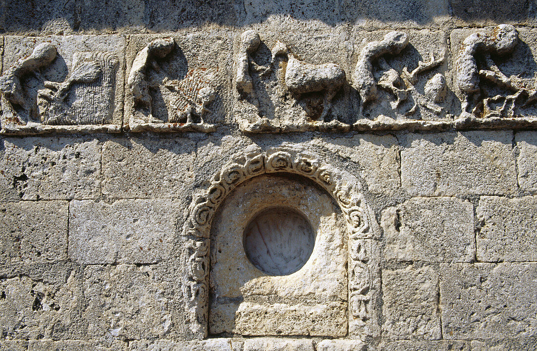Frieze representing calendar of agricultural tasks of romanesque church of San Bartolomé (13th century). Campisabalos. Sierra de Ayllon. Guadalajara province. Castilla-La Mancha. Spain