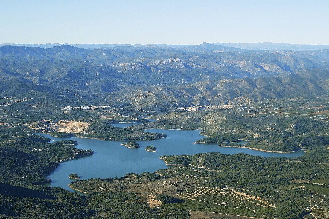 Sichar reservoir, Mijares river and Alto Maestrazgo mountains in background. Castellón province, Comunidad Valenciana, Spain