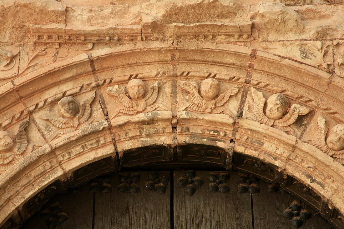 Detail of the Plateresque gate of the church of la Asunción (S.XVI) en Hornos de Segura. Jaén province. Spain
