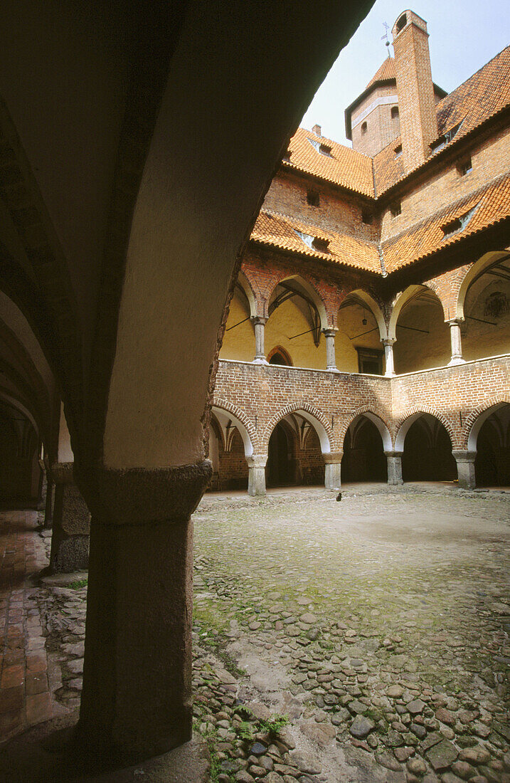 Cloister of Gothic castle built 2nd half 14th century. Lidzbark Warminski. Poland