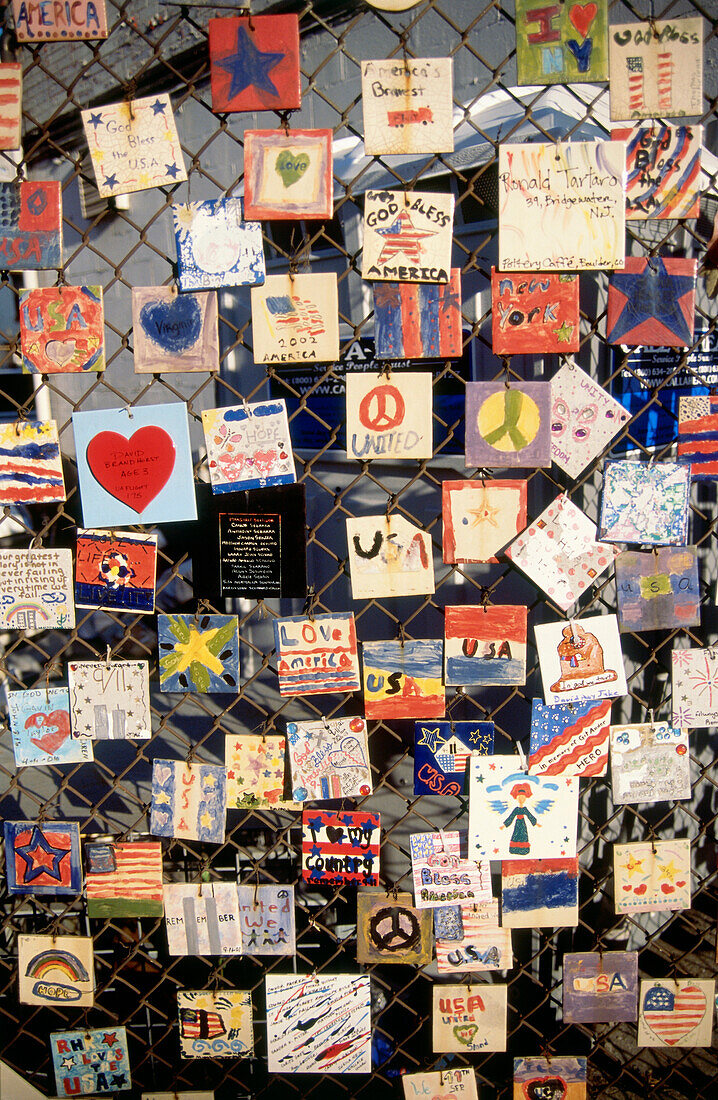 Childrens drawings on a fence in Greenwich Village, Manhattan, New York, USA, America