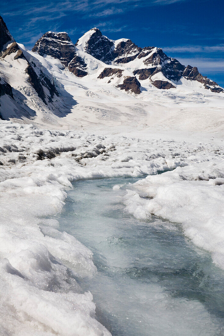 Englacial stream with mount Jungfrau in background, Konkordiaplatz, Canton of Valais, Switzerland