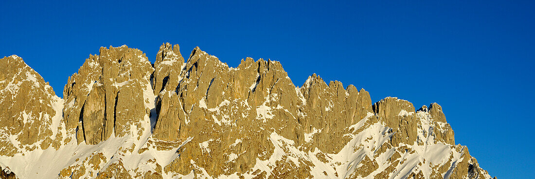 panorama of Wilder Kaiser south faces seen from hut Gruttenhütte: Vordere Goinger Halt, Goinger Scharte, Nördliche Törlspitze, Goinger Turm, Goinger Törlspitze, Westliches and Östliches Törleck, Törltürme, Törlwand and Regalmwand, Wilder Kaiser range, Kai