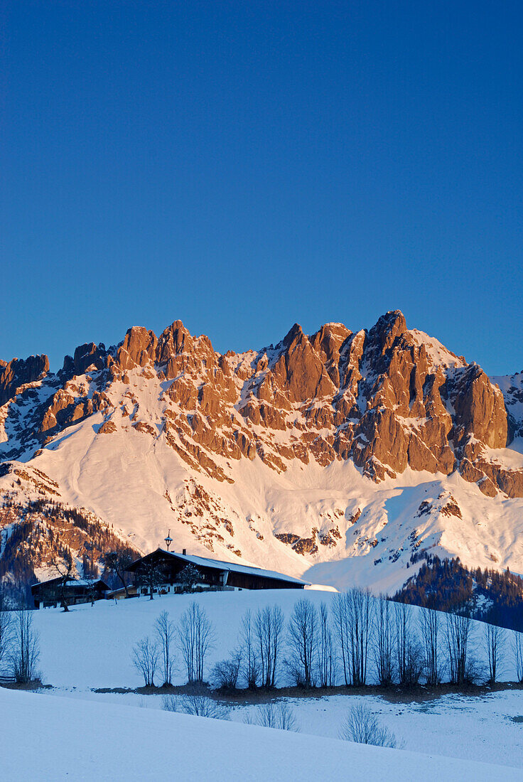 sunrise at Wilder Kaiser range, south faces with farm house, Wilder Kaiser range, Kaisergebirge, Tyrol, Austria