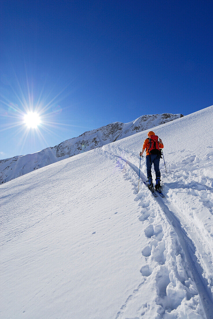 young woman ascending Haglertal, Allgaeu range, Allgaeu, Tyrol, Austria