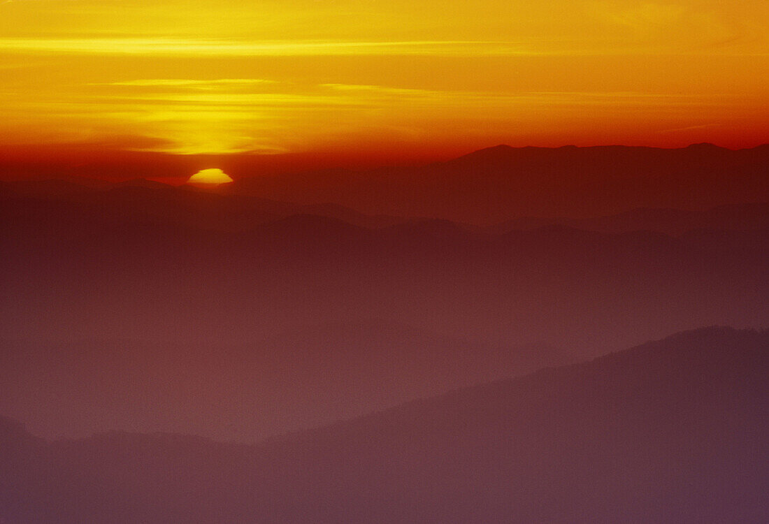 Mist shrouded North Carolina mountain ridges at sunrise from Clingman’s Dome, Appalachian mountain sunrise. Great Smoky Mountains NP, TN, USA