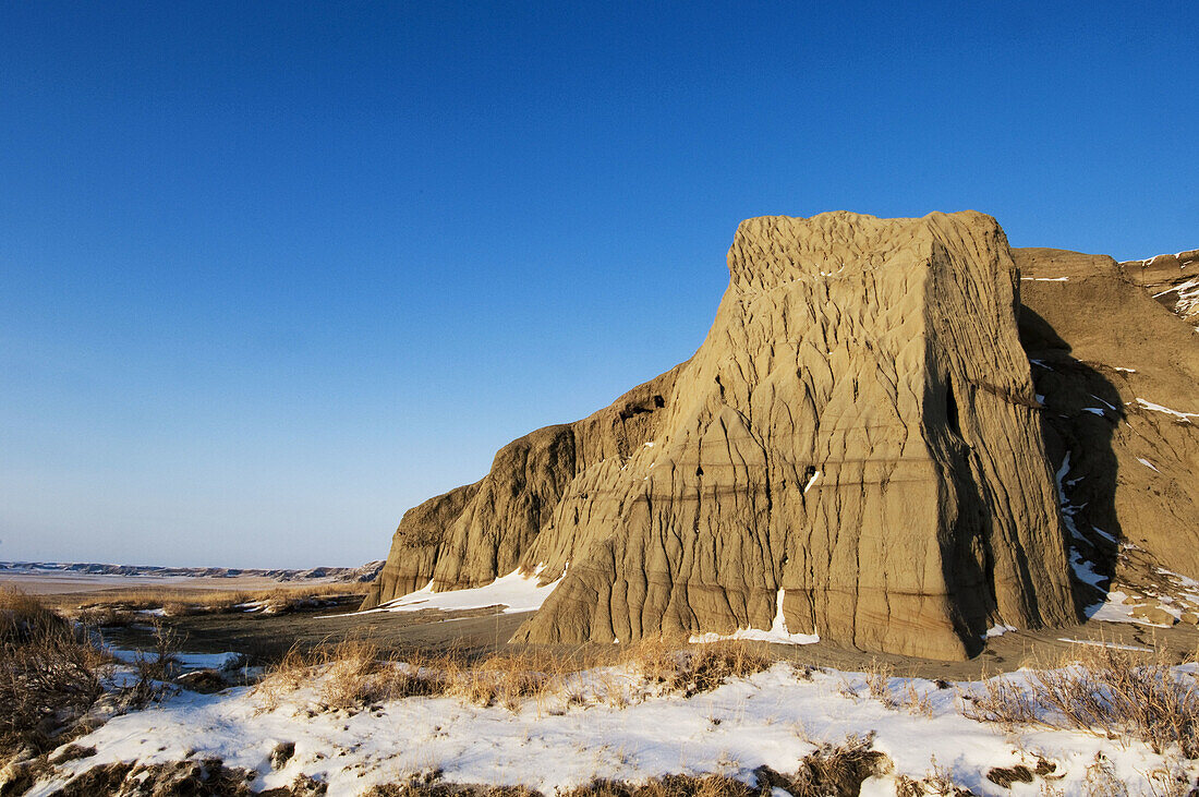 Castle Butte formation in Big Muddy Badlands with fresh snow. Bengough, Saskatchewan, Canada 