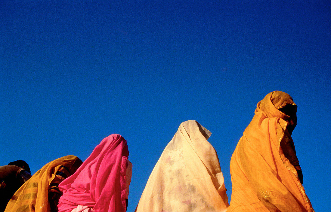 Women in saris. India