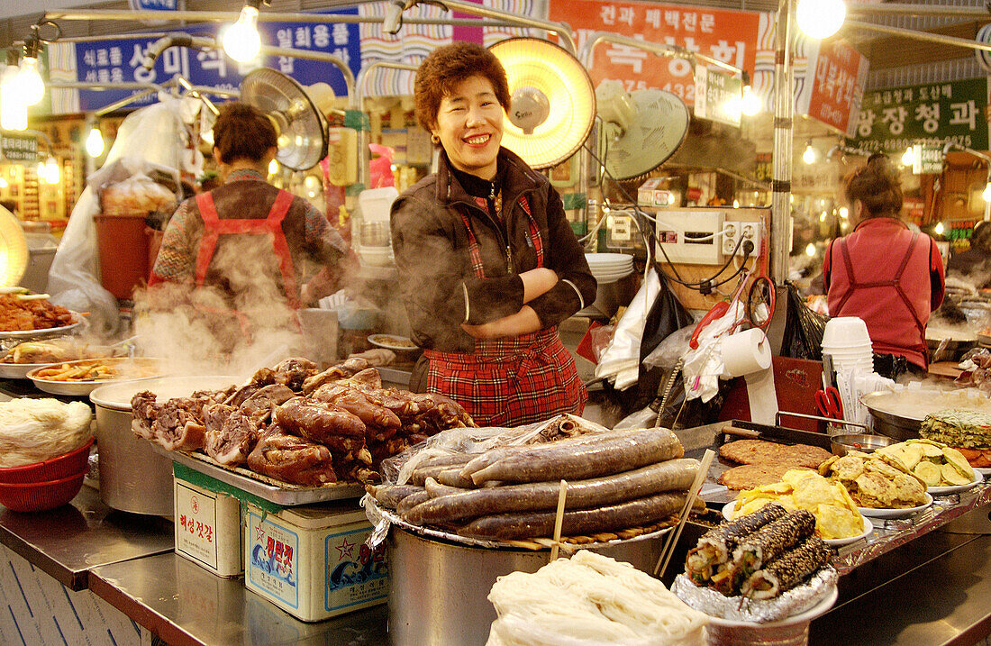 Food vendor, Dongdaemon market. Seoul, South Korea.
