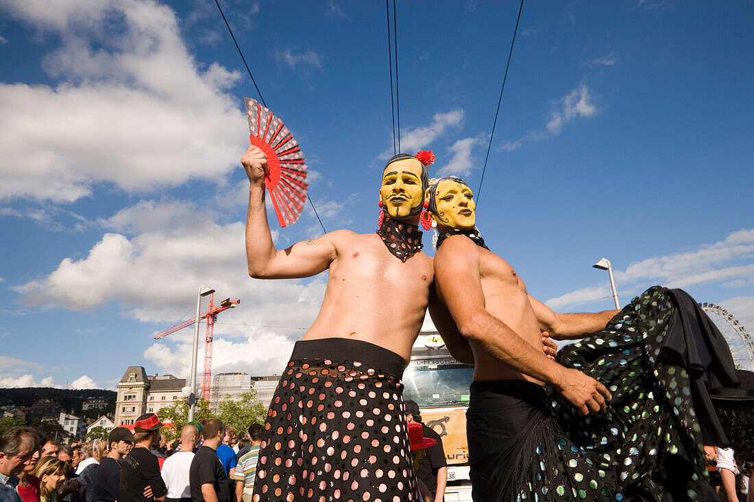Two disguised men near Quai Bridge, Street Parade, the most attended technoparade in Europe, Zurich, Canton Zurich, Switzerland