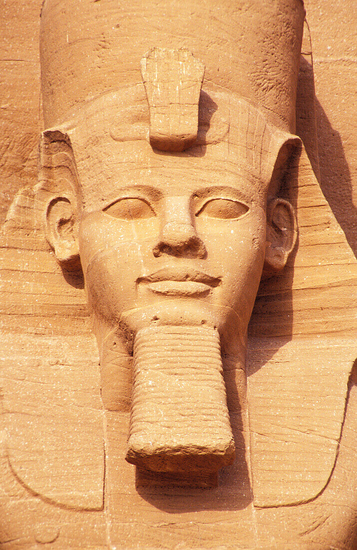 Head of colossal statue at Abu Simbel temple. Egypt