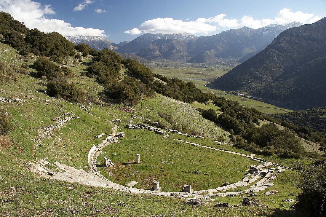 Archaeological Site of Arcadic Orchomenos. The ancient theatre of early Hellenistic date (4th/3d century B.C.). Early Hellenistic theatre ruins. Orchomenos, Arcadia, Peloponnese, Greece.