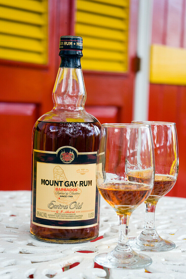 A bottle and two glasses of Mount Gay Rum, Mount Gay Rum Factory, near Bridgetown, Barbados, Caribbean