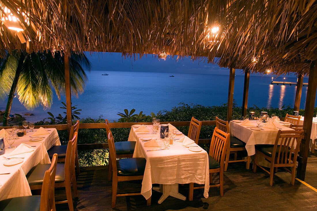 Terrace of the restaurant Mango's By the Sea in the evening, Speightstown, Barbados, Caribbean