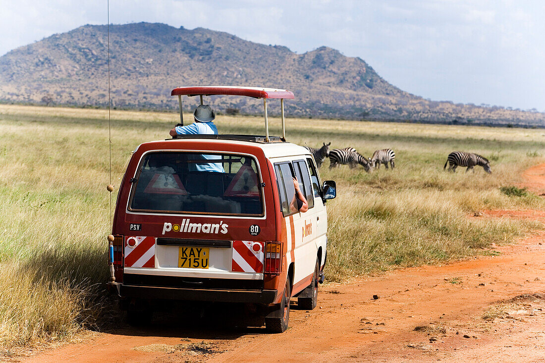Safari bus on the way in Tsavo East National Park, Coast, Kenya