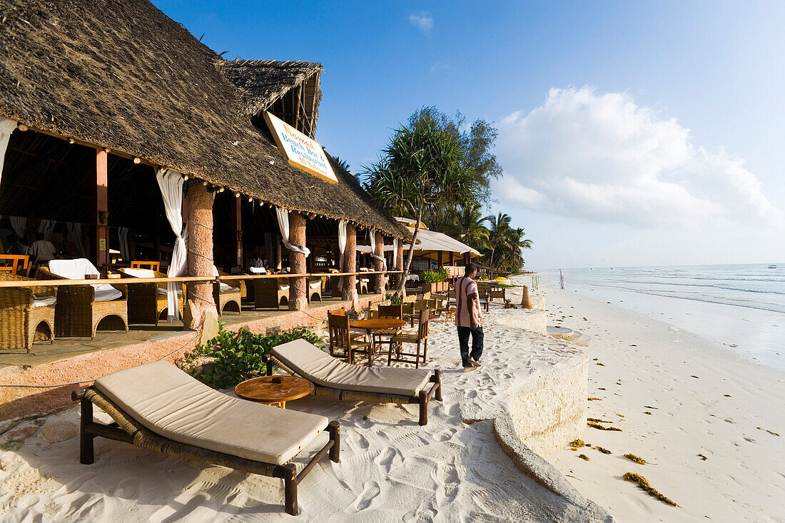 Beach restaurant with sunloungers at beach, The Sands, at Nomad, Diani Beach, Kenya