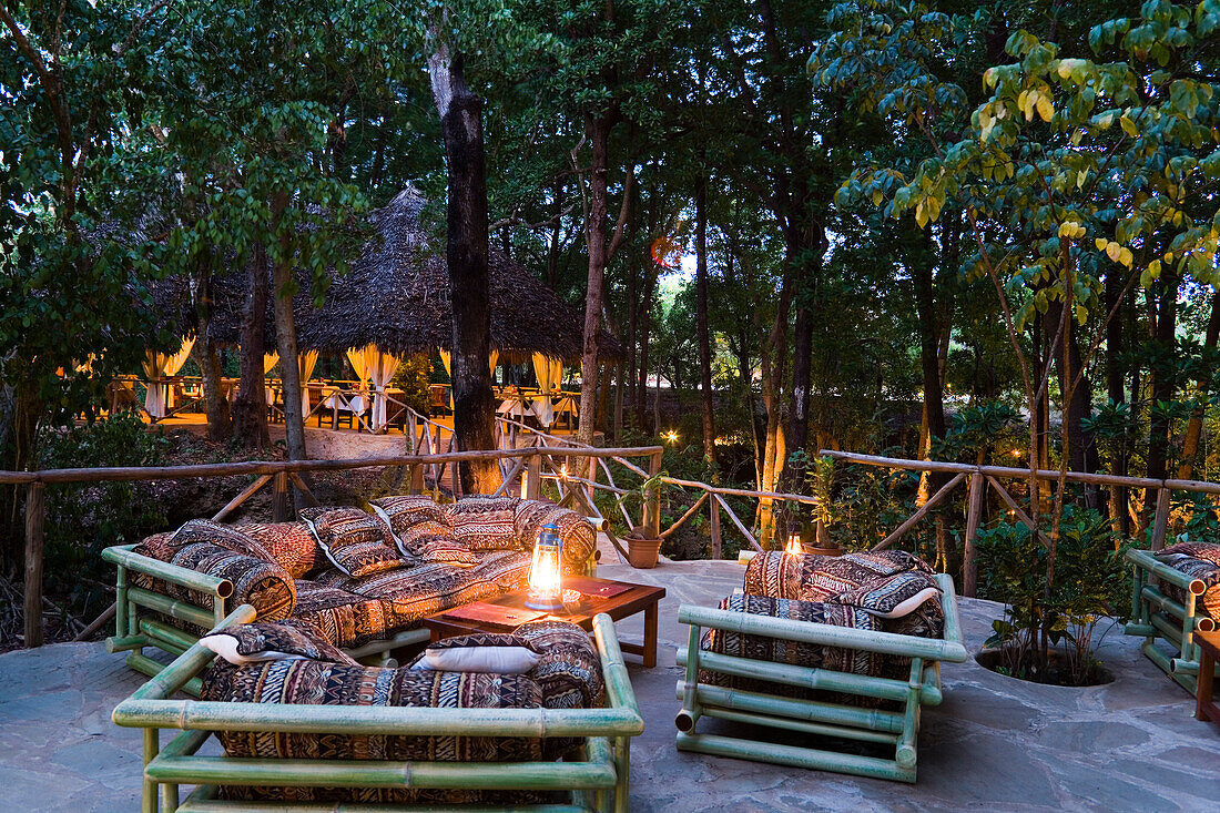 Illuminated bridge to dining room, The Sands, Chale Island, Coast, Kenya