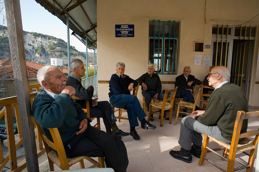 Older men sitting in a cafe, Kafenion, Pano Panagia, Troodos mountains, South Cyprus, Cyprus