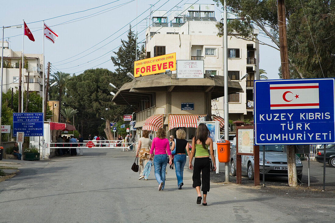 Four women at the Ledra Palace checkpoint, border, Green Line, United Nations Controlled Area, divided city, Lefkosia, Nicosia, Cyprus