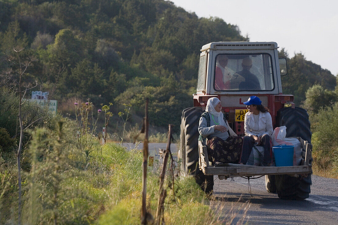 Tractor with local people near Dipkarpaz, Rizokarpaso, Karpasia, Karpass Peninsula, North Cyprus, Cyprus