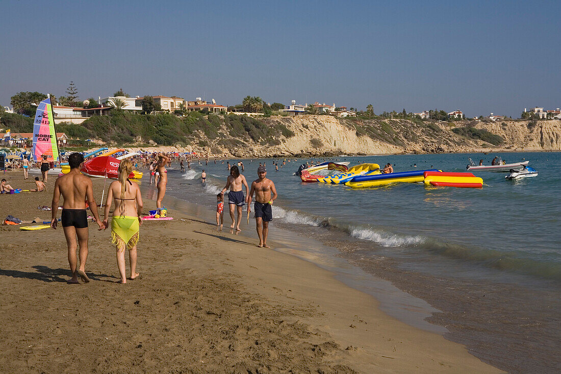 People on the beach at Coral Bay, Paphos area, South Cyprus, Cyprus