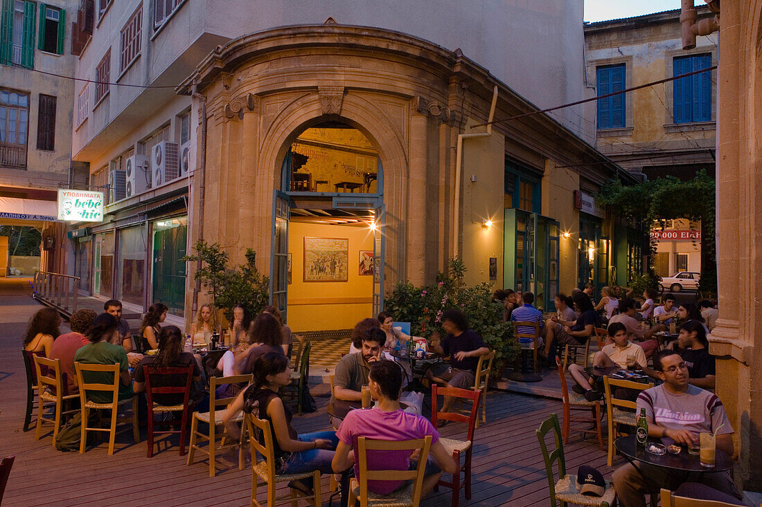 Students sitting outside a cafe, coffee shop near Faneromeni Church, Lefkosia, Nicosia, Cyprus