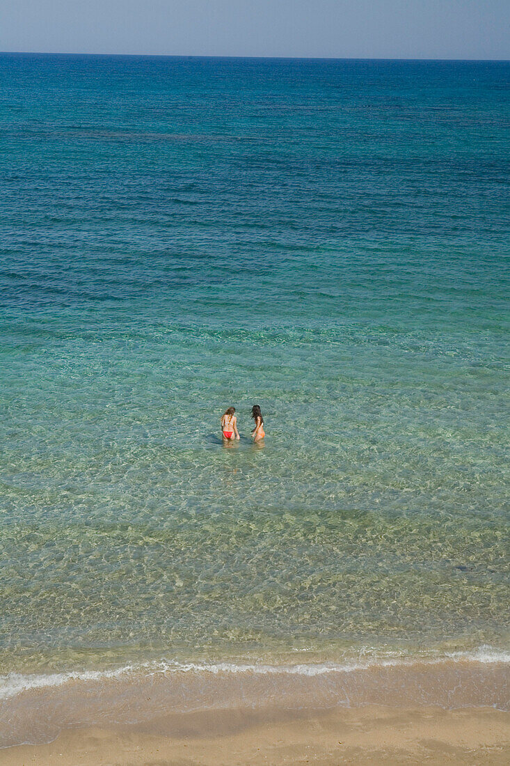 Two women swimming in the sea, Salamis Beach, Mimoza Beach Hotel, Salamis, Cyprus