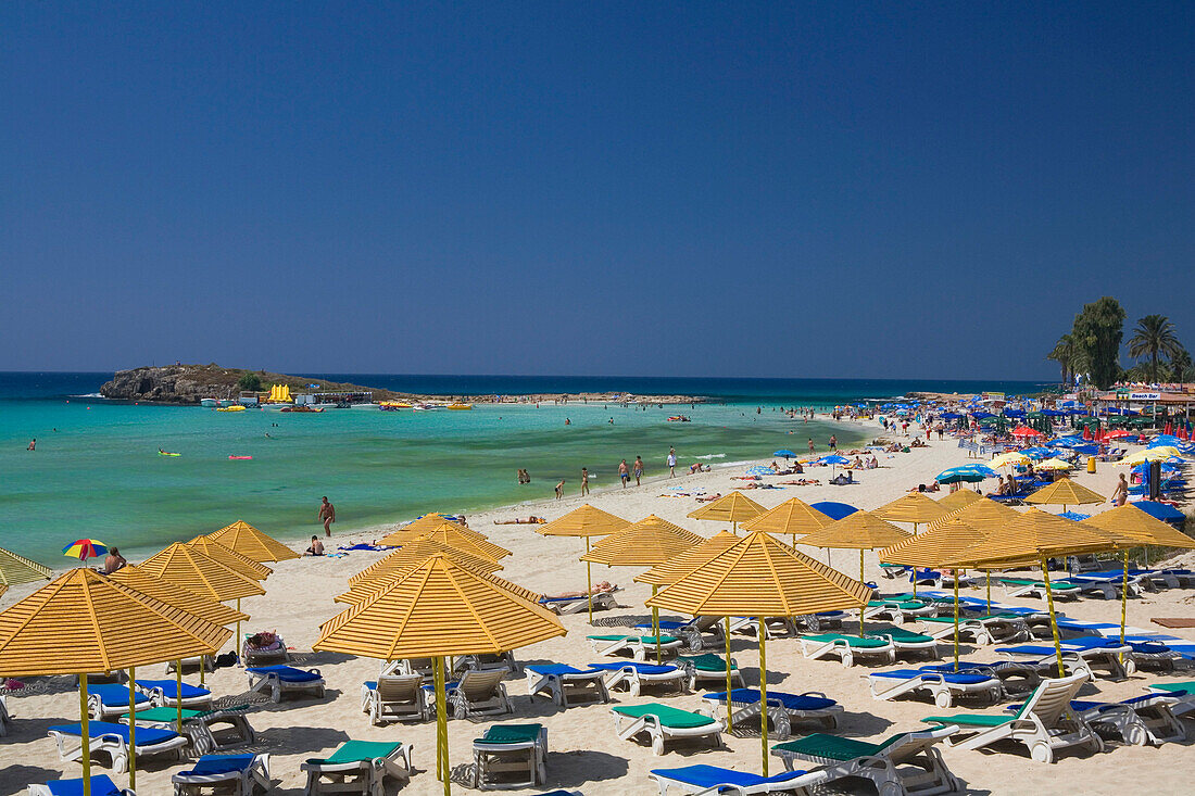 Nissi Beach with sun loungers and sunshades, Agia Napa, South Cyprus, Cyprus