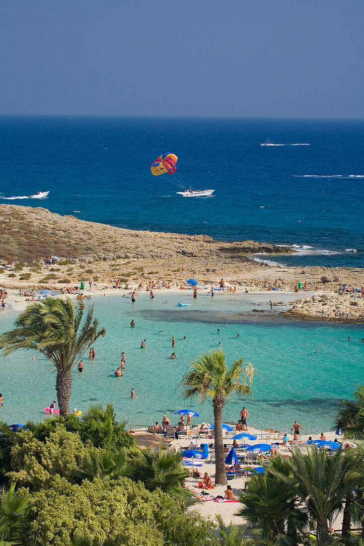 View of Nissi beach with palm trees, Agia Napa, South Cyprus, Cyprus