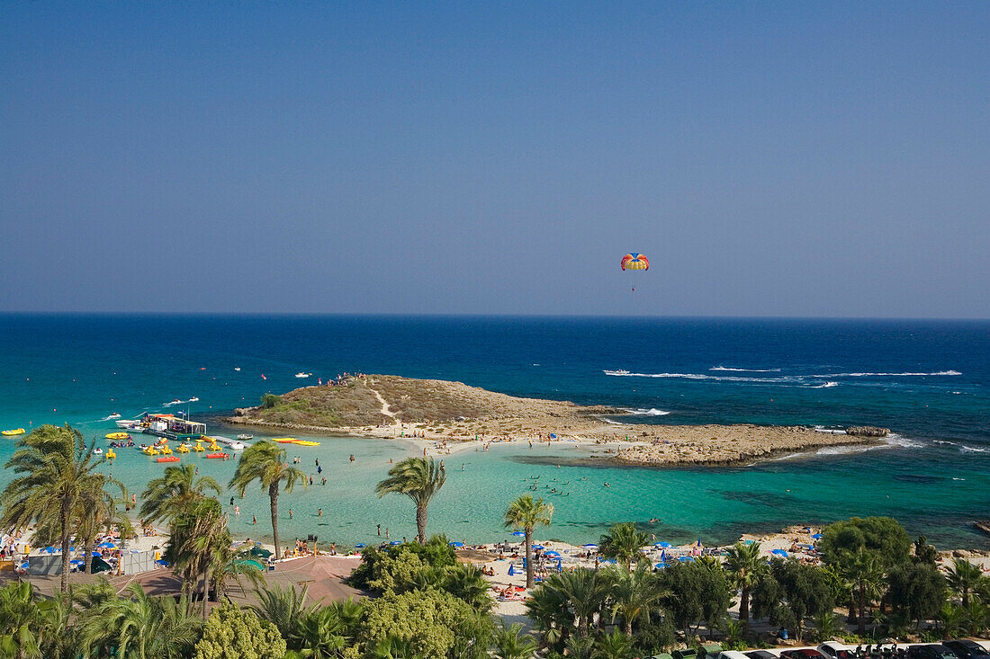 View of Nissi beach with palm trees, Agia Napa, South Cyprus, Cyprus