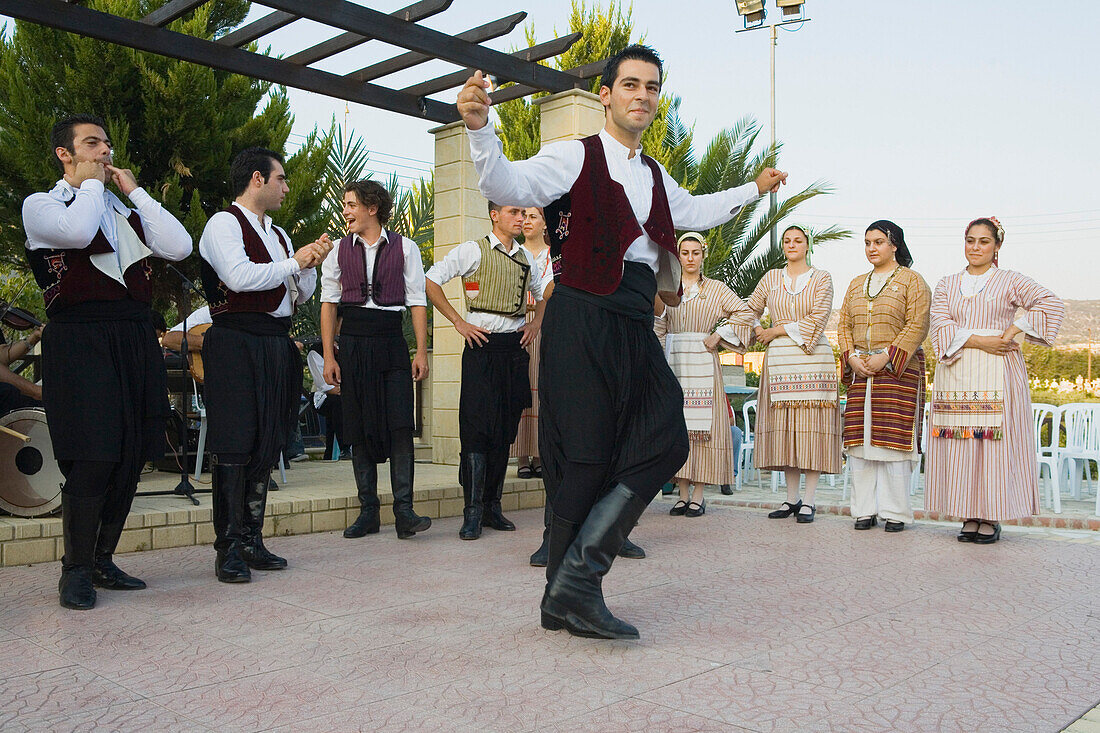 A group of men and women dancing, Cypriot Folk dance, Commandaria Wine Festival, Limnati, Cyprus