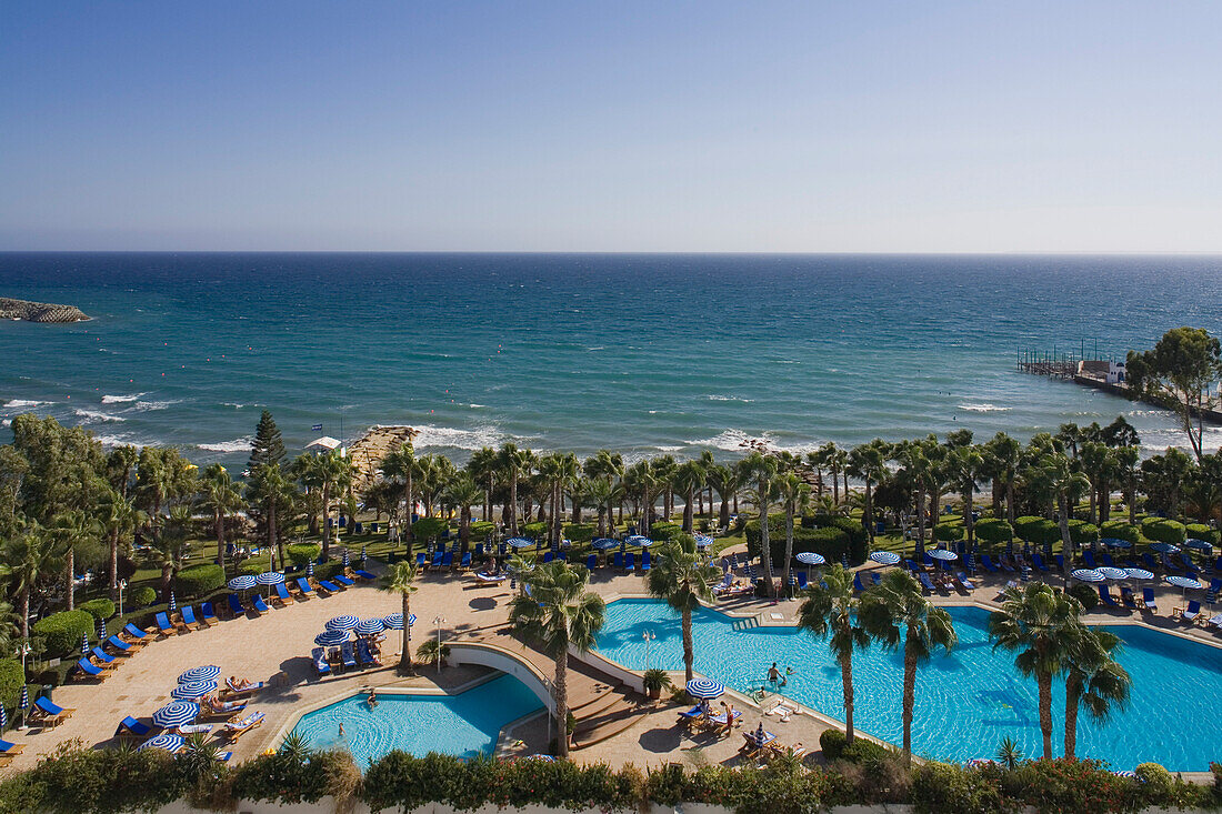 Swimming Pool surrounded by palm trees, Hotel Hawai, Limassol, Cyprus