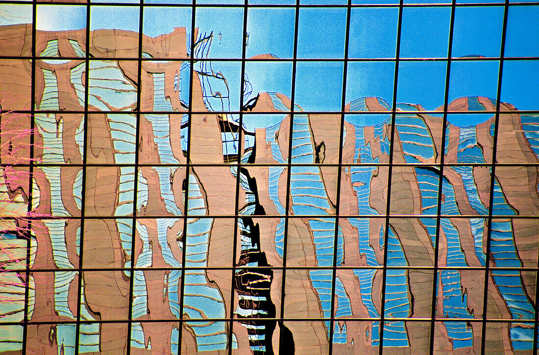 Reflection of office building under construction