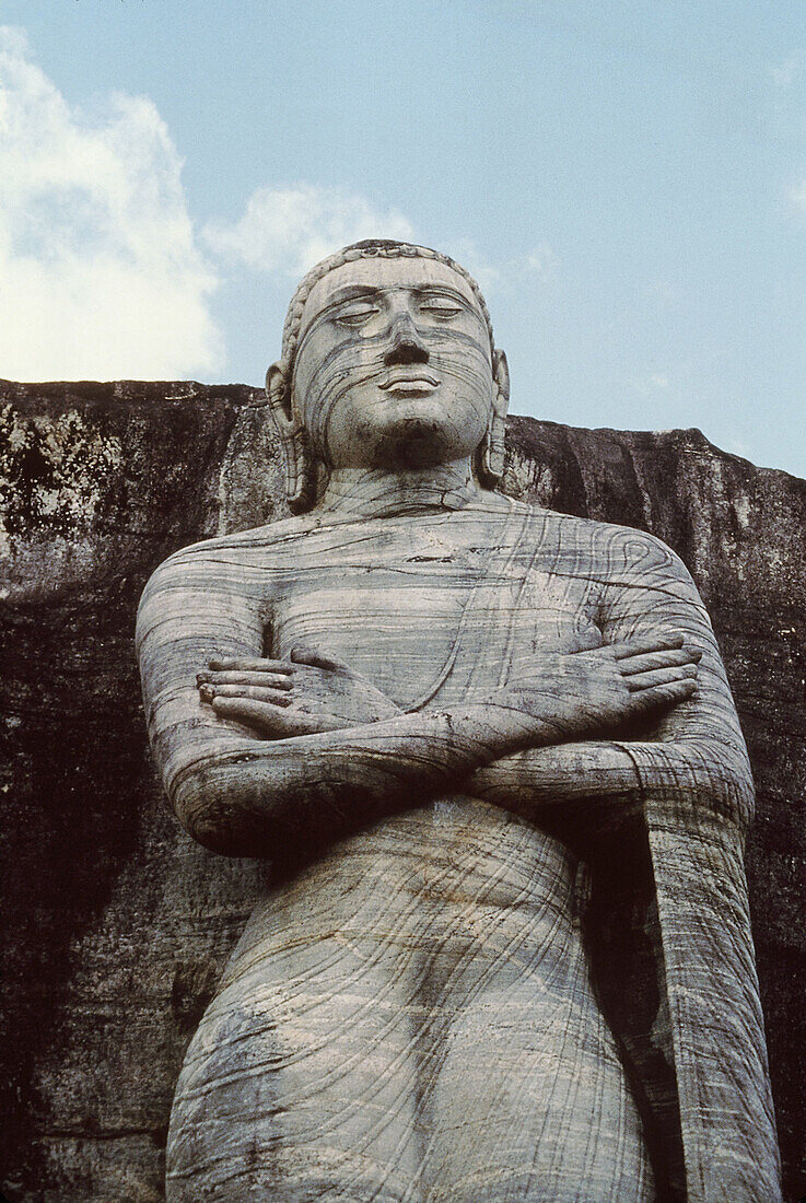 Ancient architecture. Upper portion of the figure, Anand. Gal Vihara. Polonnaruva, Sri Lanka.