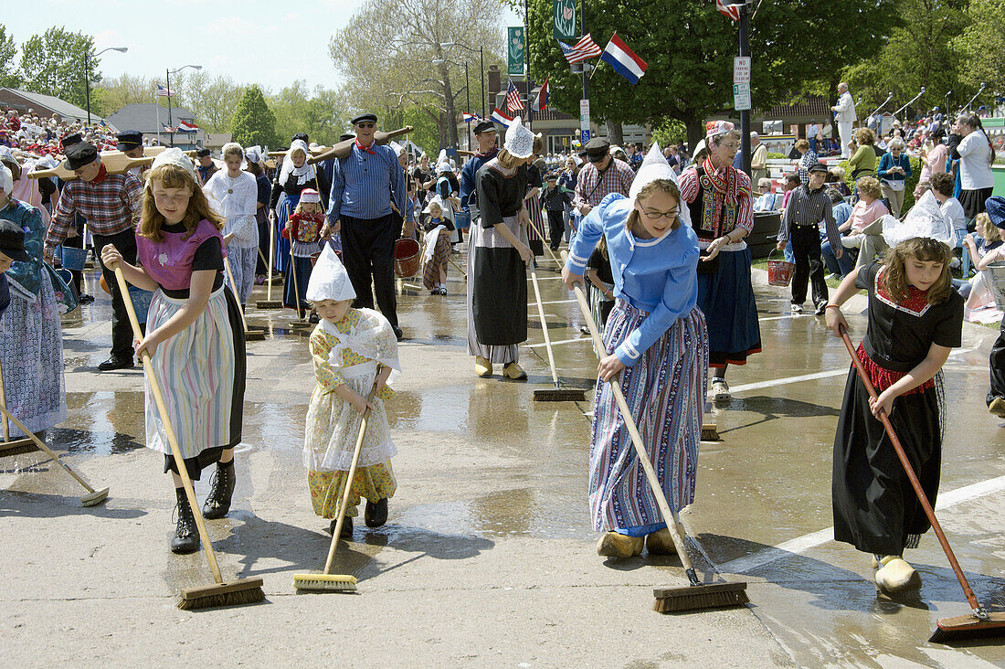 Street washing, a dutch custom in preparation for the Tulip Time parade in Pella, Iowa, USA.