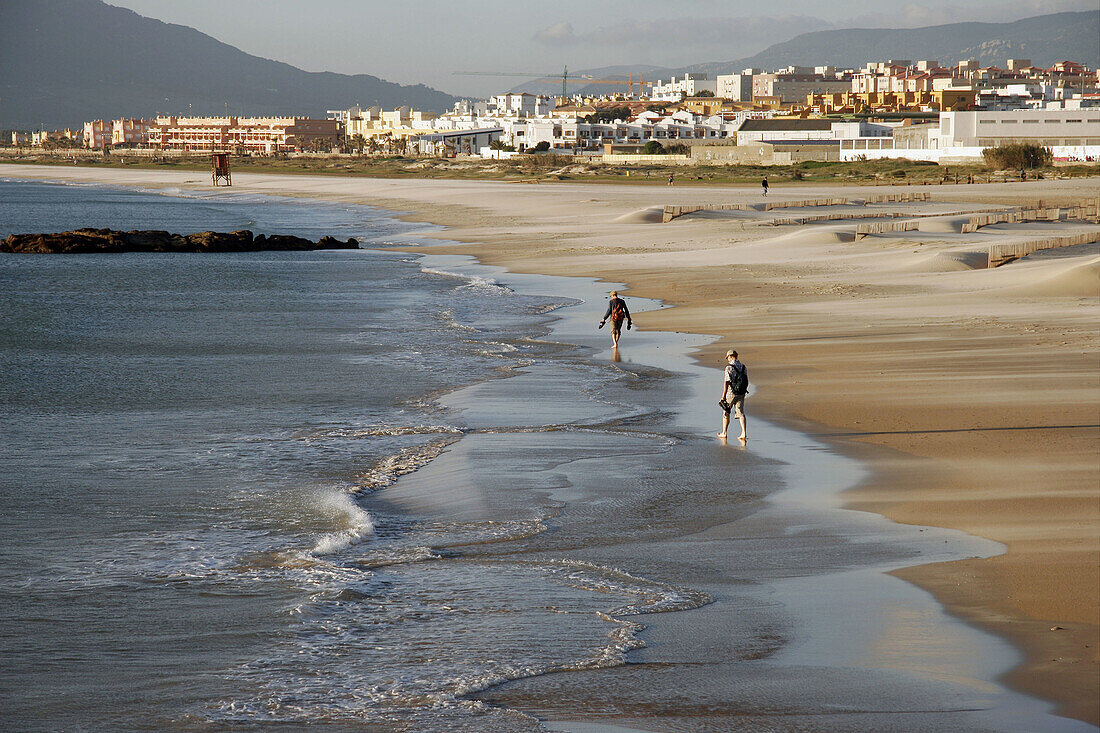 People walking on beach, Tarifa. Cádiz province, Andalusia, Spain