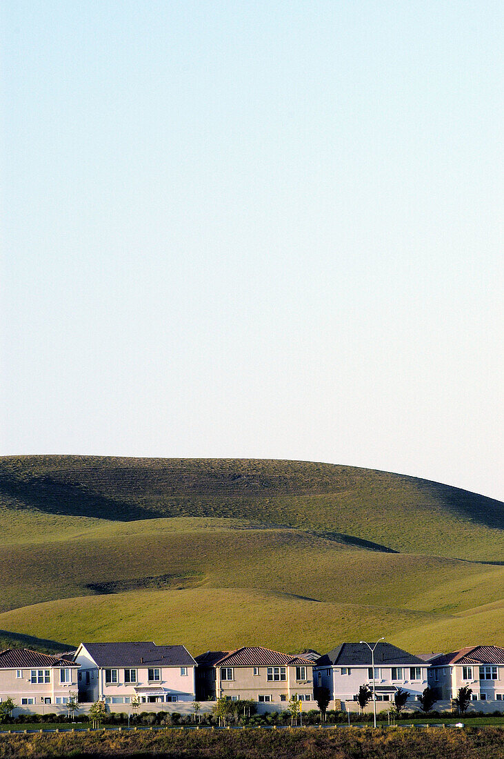 Suburban tract homes and hills. Dublin, California. USA.