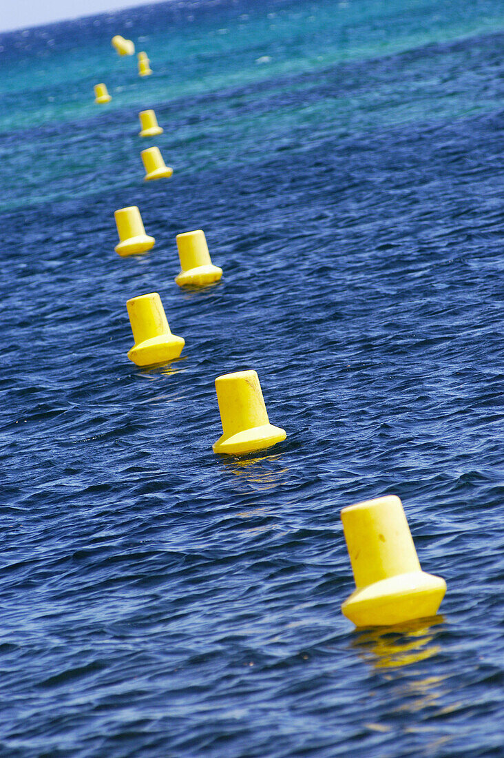 Yellow buoys in the water. St-Tropez. France