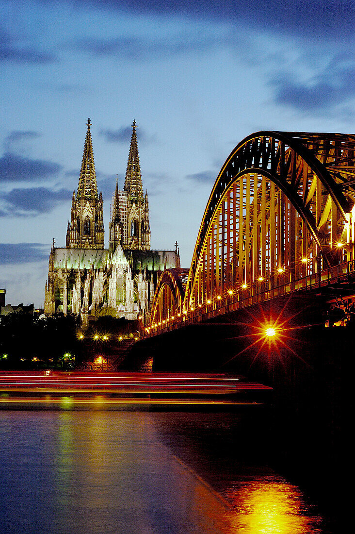Cathedral and Hohenzollern Bridge at night. Cologne. Germany