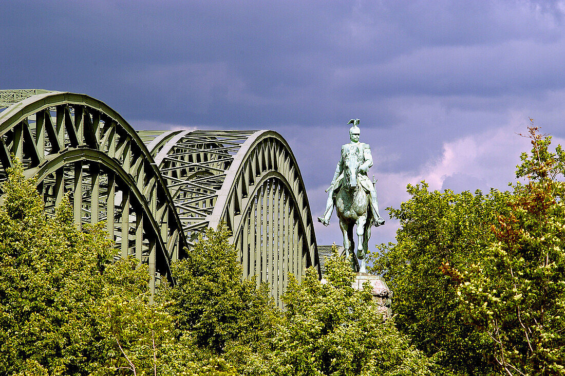 Hohenzollern Bridge and Statue. Cologne. Germany