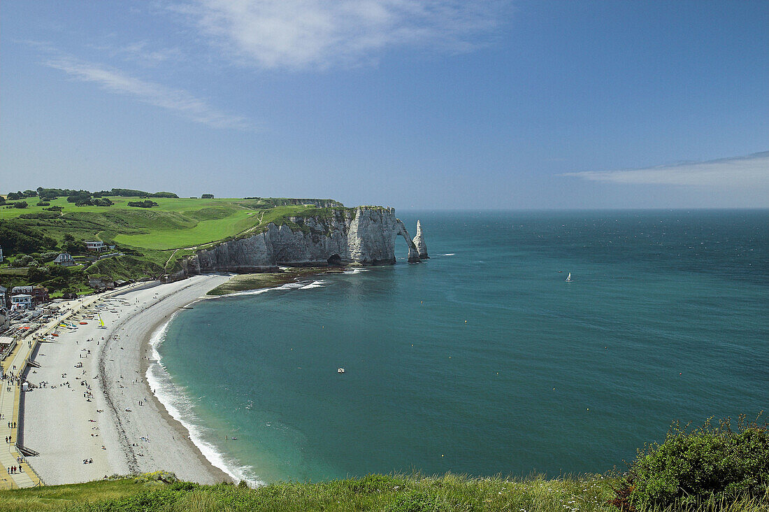 Beach and rock arch of Etretat. Normandy. France