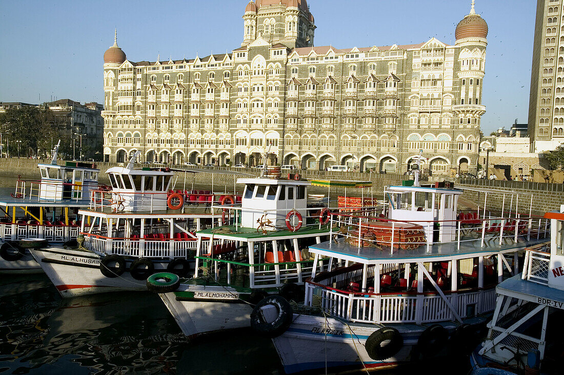 Boats in front of the Taj Mahal Palace & Tower. Mumbai (ex Bombay). India